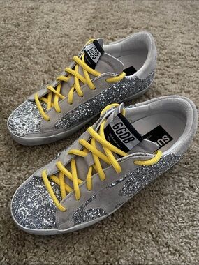 GoldenGoose Superstars Silver Glitter Sneakers with Yellow Laces